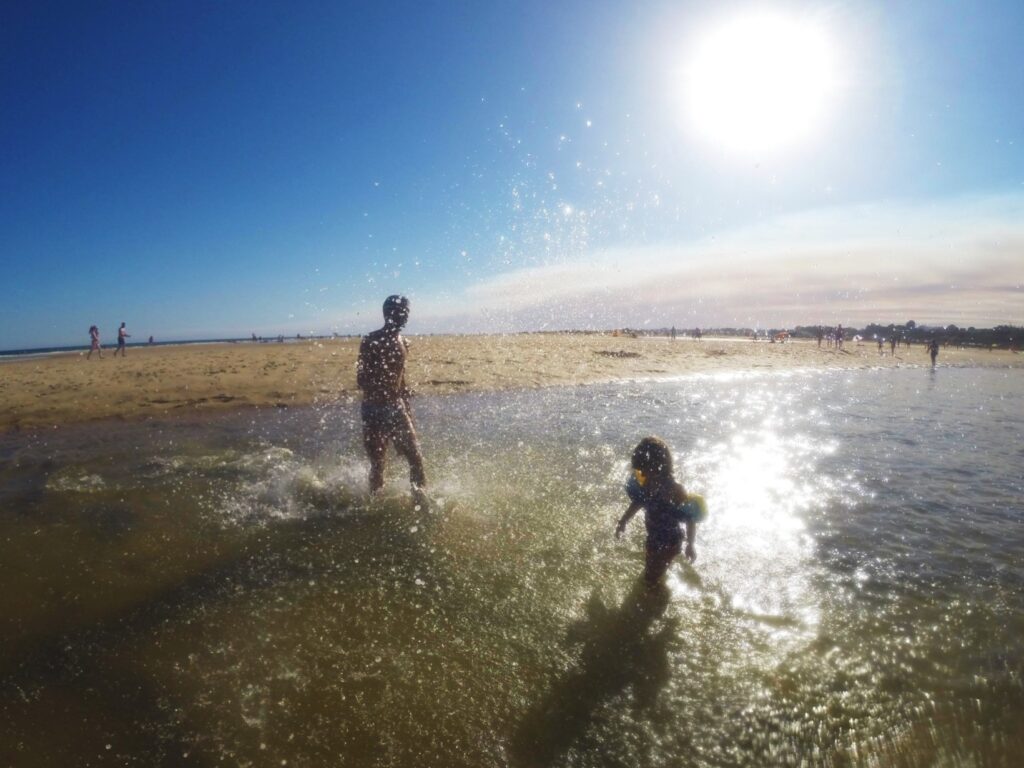 Children playing in the sea