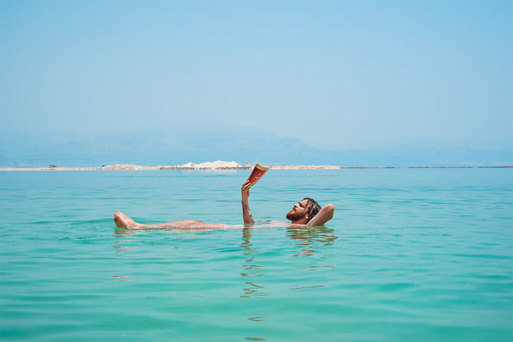 Enjoying a read in the sea