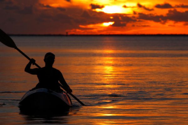 kayaking at sunset