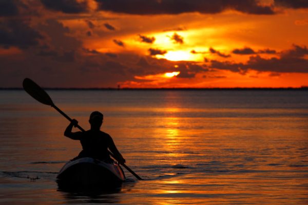 kayaking at sunset