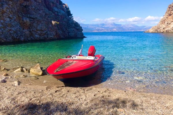 Red speedboat in Mirabello Bay