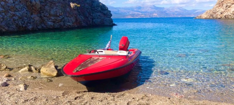 Red speedboat in Mirabello Bay